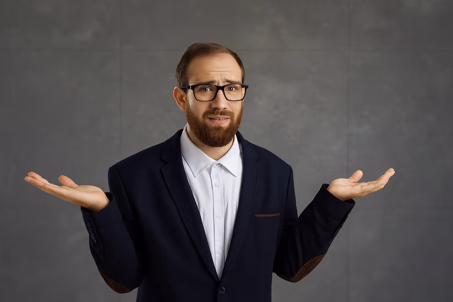 Confused businessman shrugging with raised hands, symbolizing unclear accountability and lack of ownership in data governance and security.