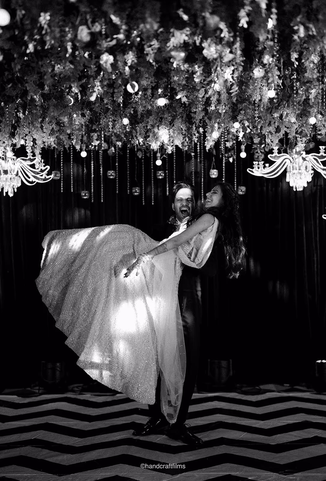 Groom lifting a bride