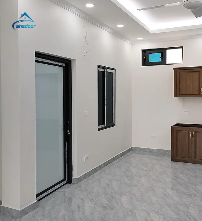 Mẫu cửa nhôm xingfa kính mờ lắp đặt cho phòng ngủ hiện đại