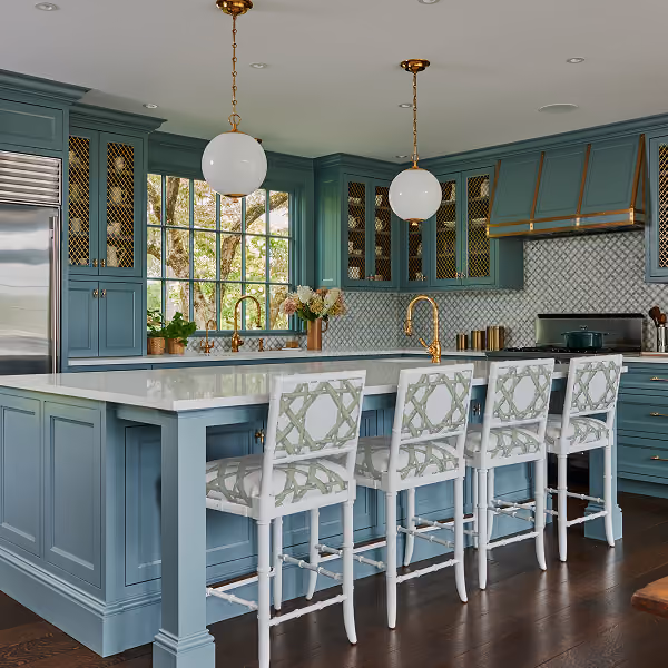 Kitchen cabinetry finished in Artifact, adding depth and character to a bright, modern space.