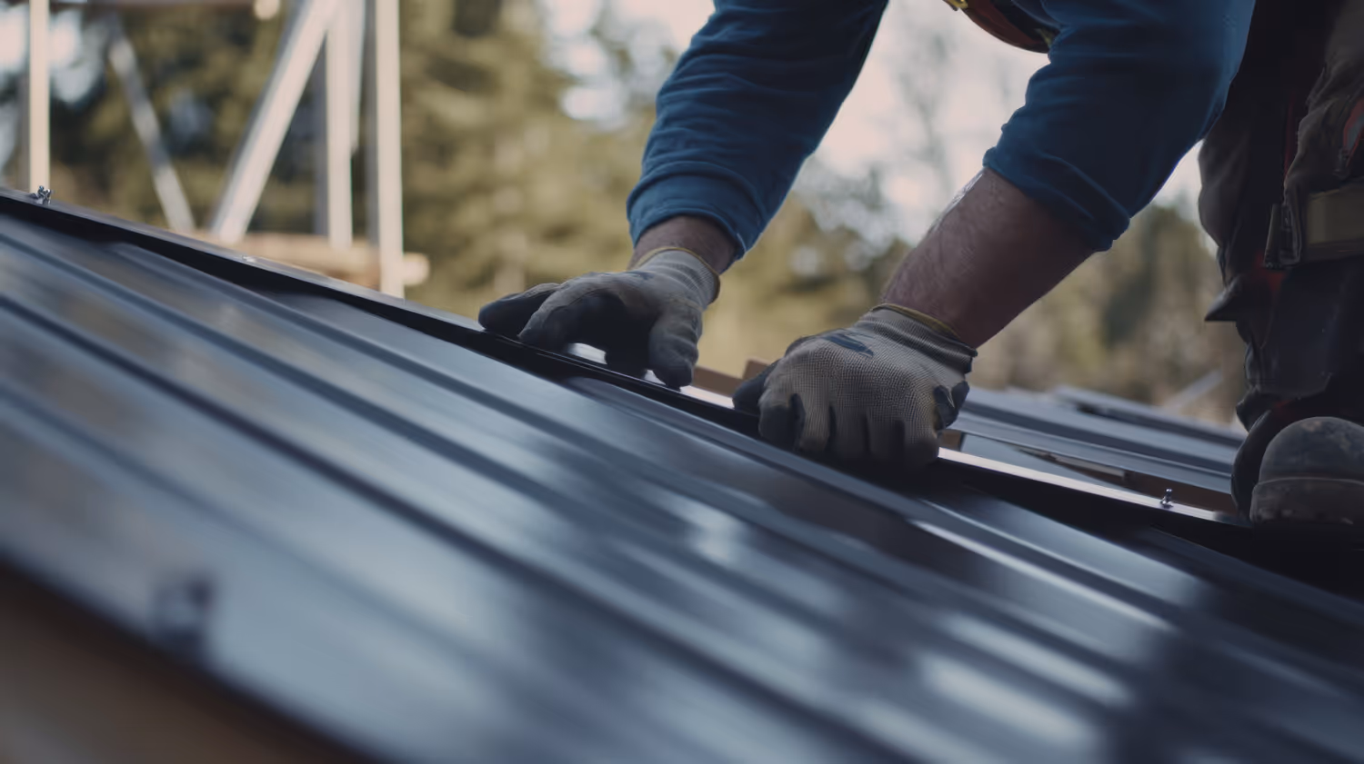 A man working on a roof installation