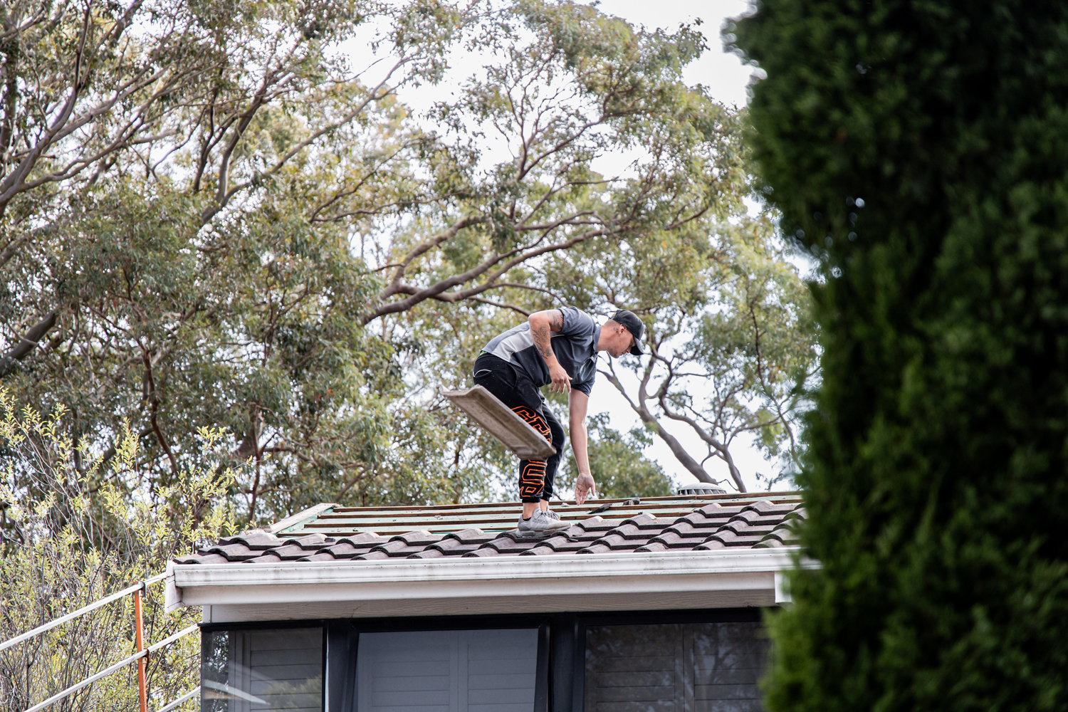 A man on a roof