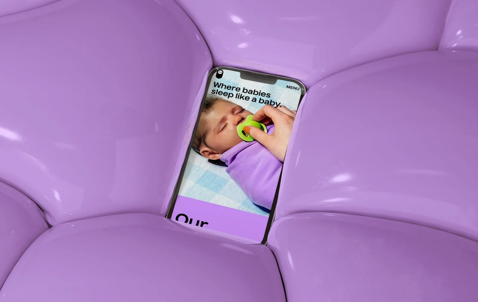 Squarespace website showcased on a mobile phone for a baby sleep coach for new parents.