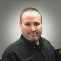 <subject>[headshot] image of customer (for a productivity tools business)</subject>