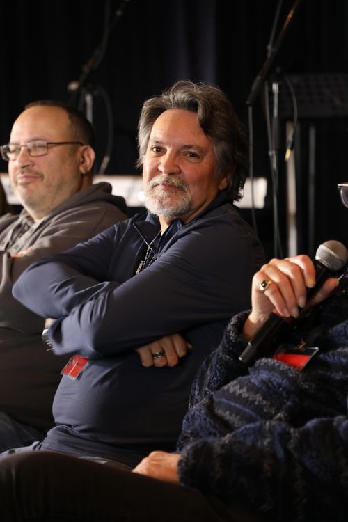 image of musician playing an instrument