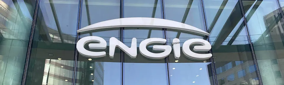 BP oil rig with people working on it