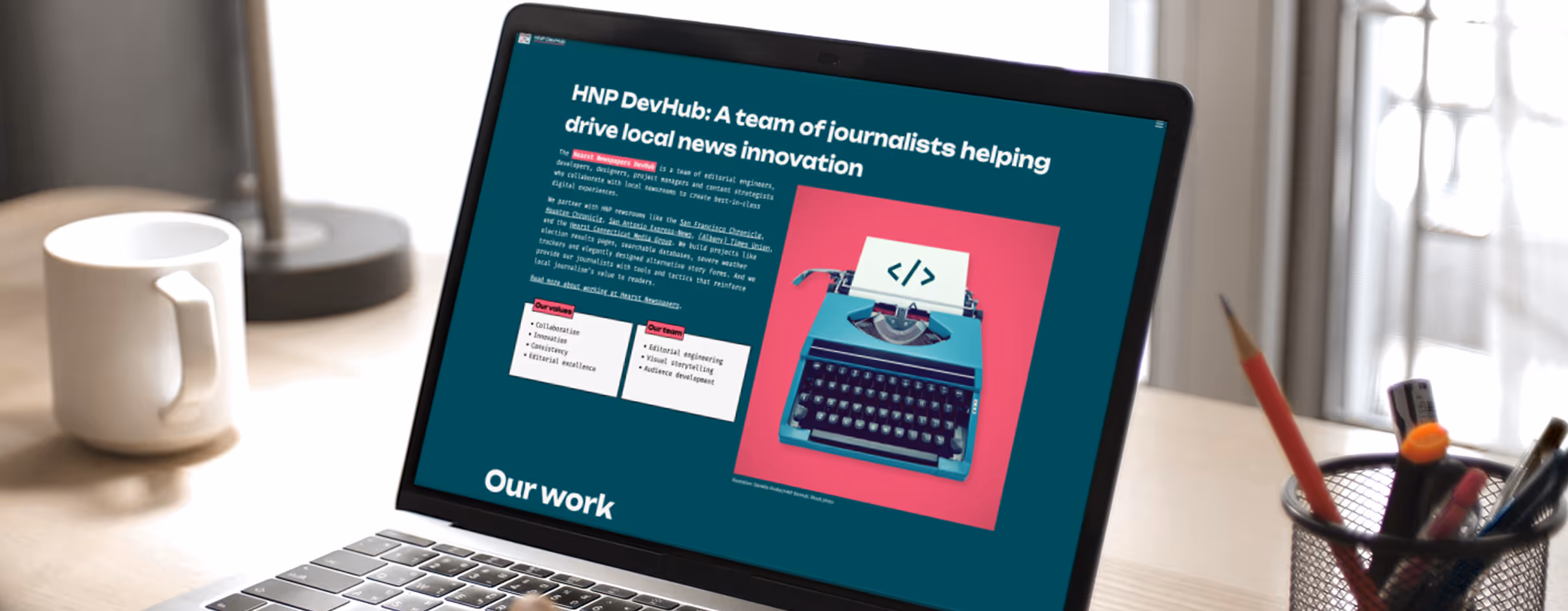 Laptop screen showing the HNP DevHub site highlighting a team of journalists supporting local news innovation.