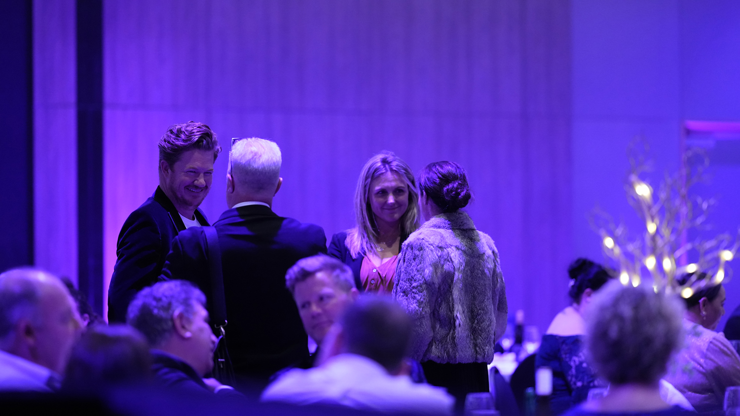 Attendees talking