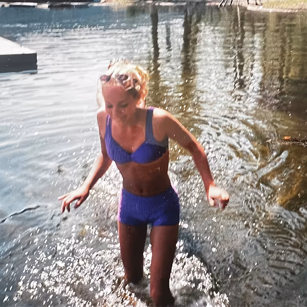 Heather Robertson swimming in a lake in 1999.
