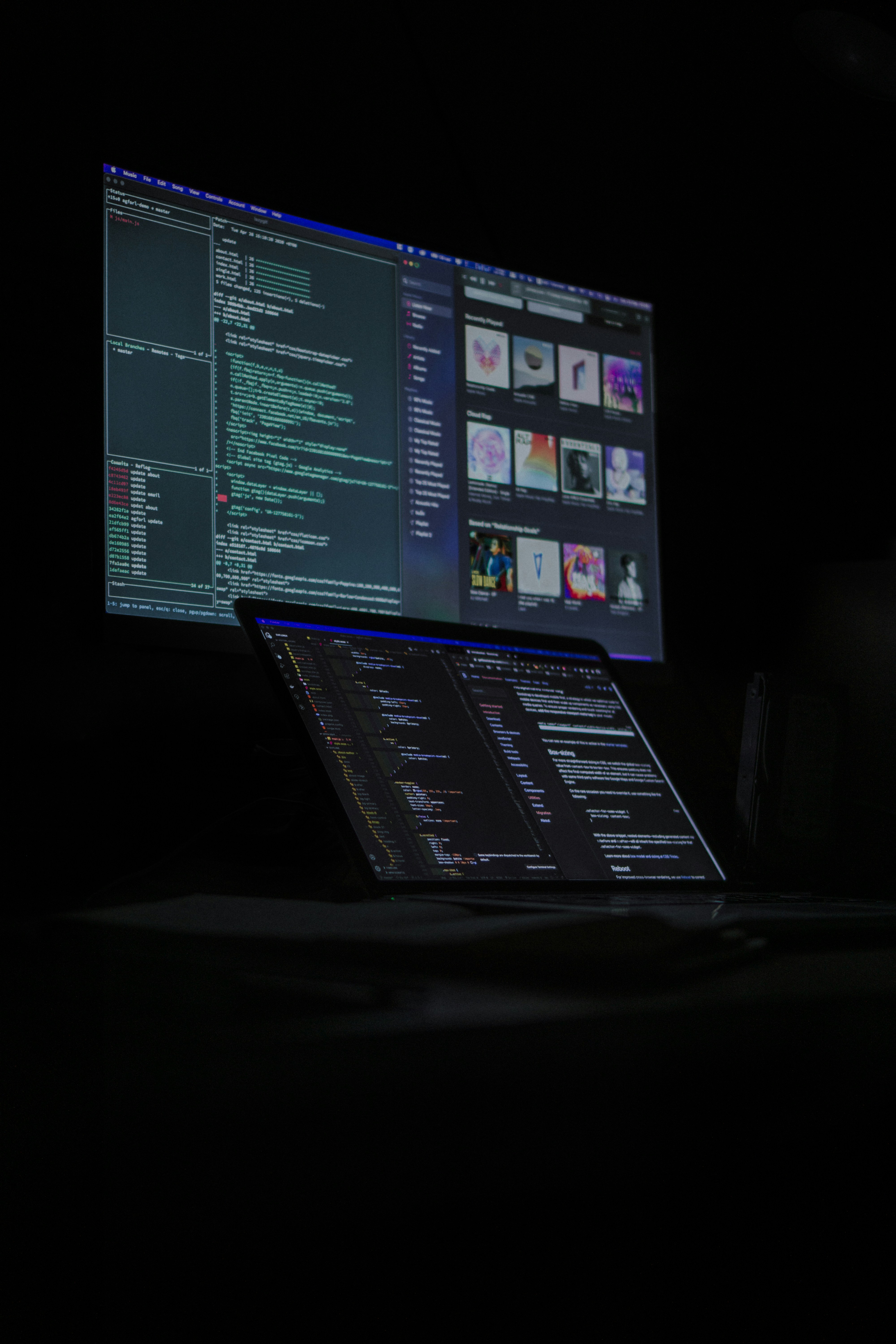 Software development and coding on laptops showing modern engineering for SME technology solutions.
