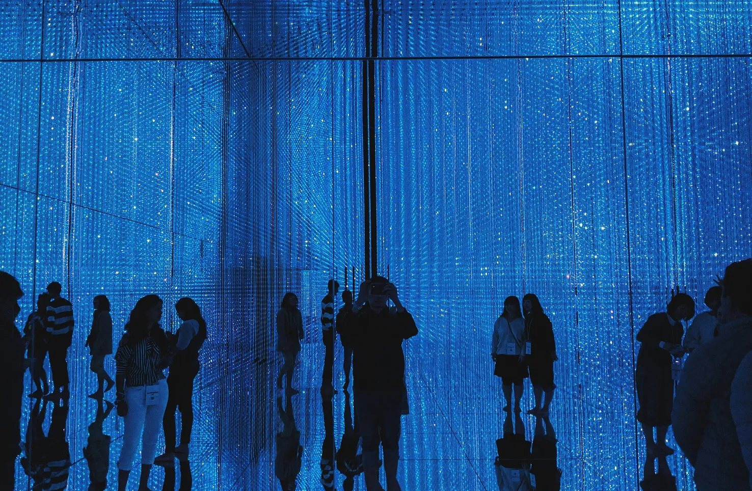 Man taking photos in a Gallery