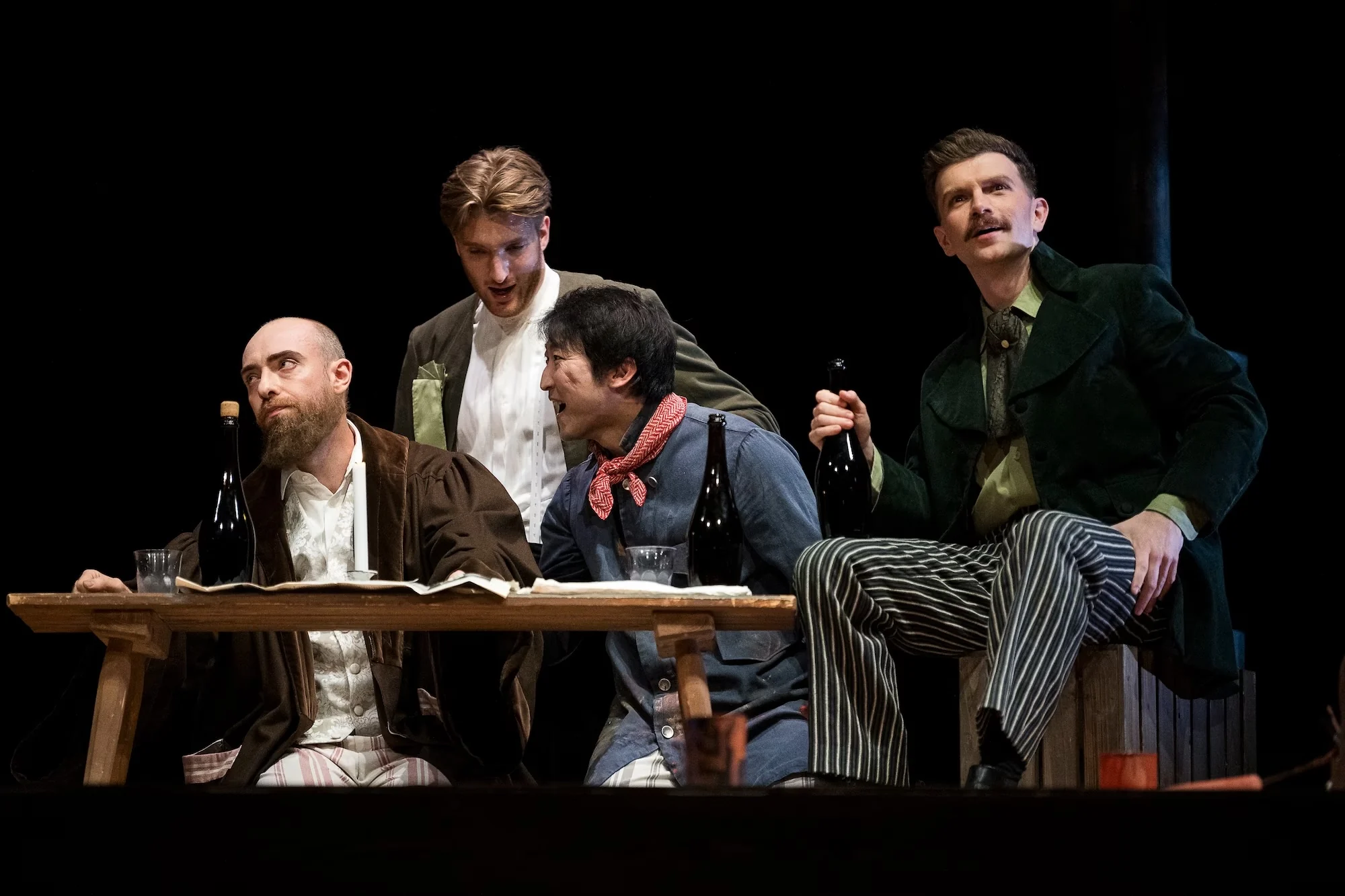 Andrew Gavin with fellow cast members in La bohème