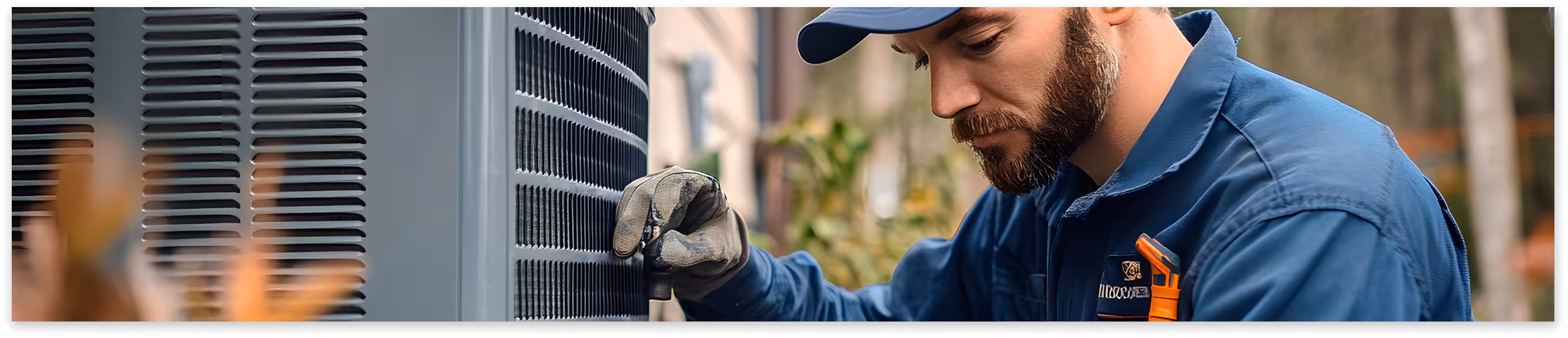 HVAC technician servicing an air conditioner