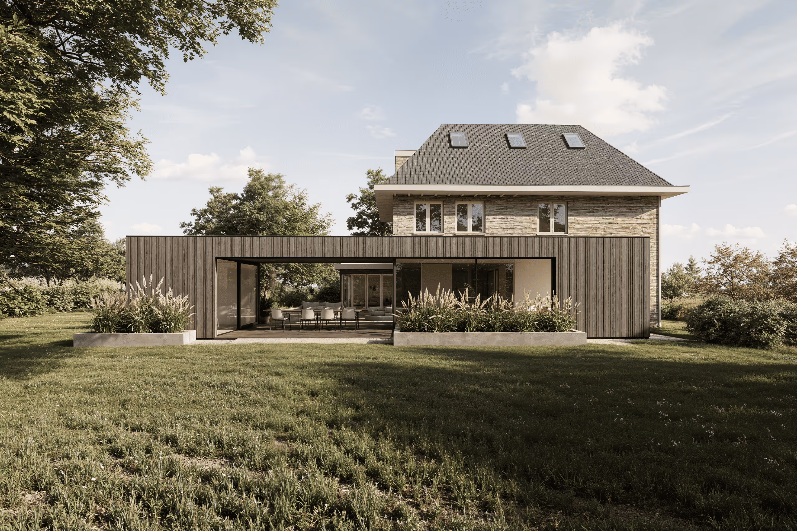 Een moderne open aanbouw contrasterend aan de jaren 30 woning.