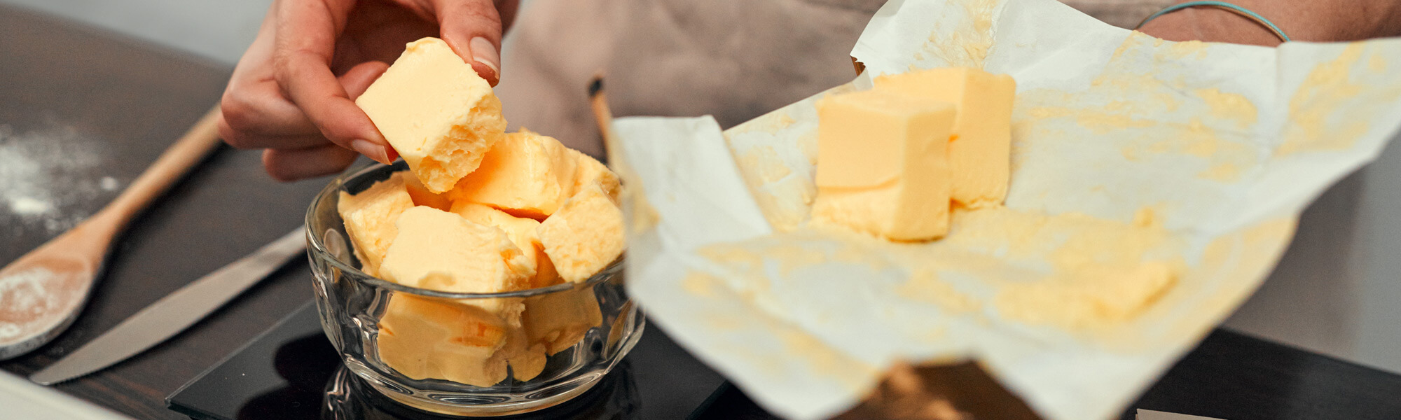 Putting blocks of butter in a cup