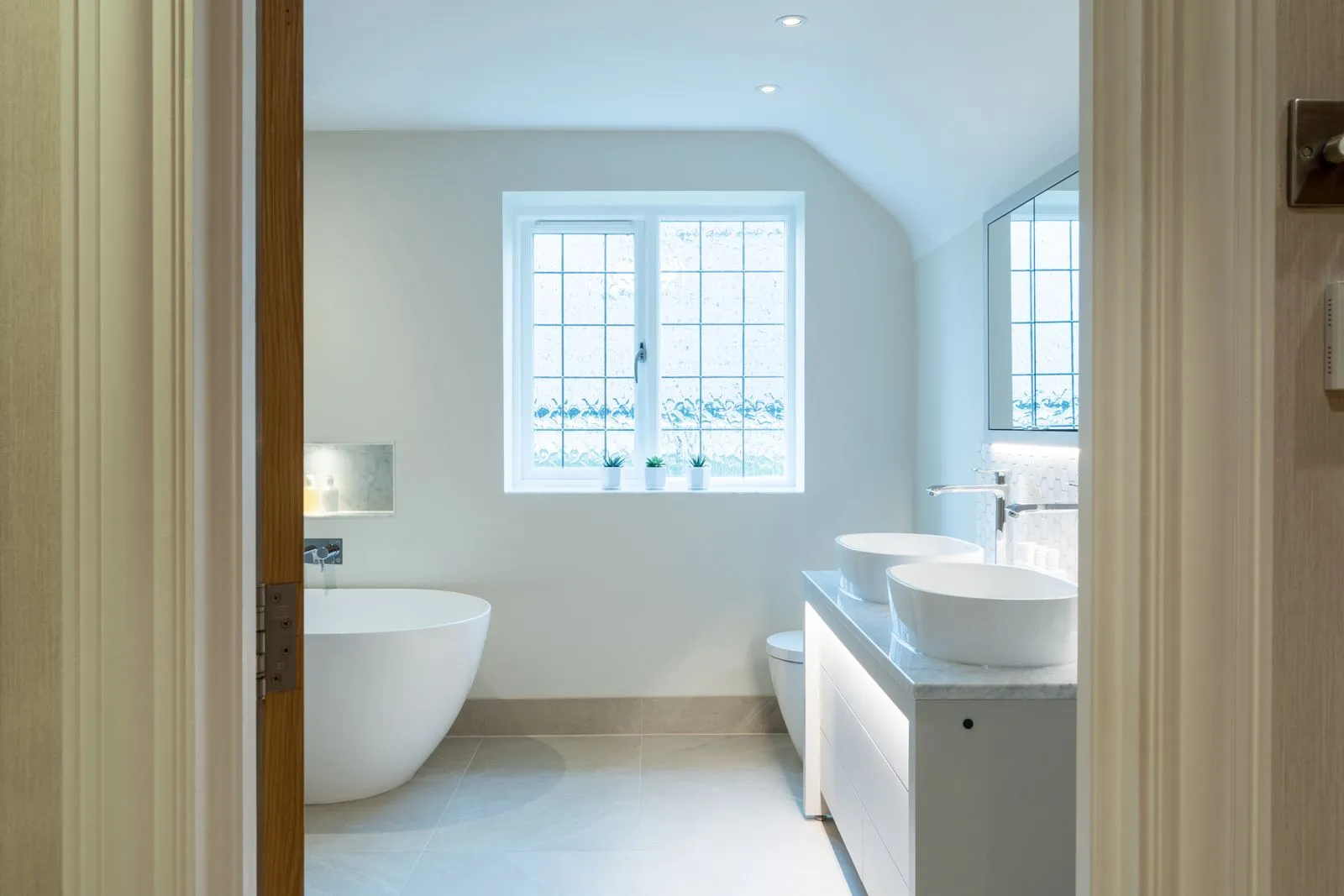 https://cdn.prod.website-files.com/68b836573a7463eca0f2a529/68b836573a7463eca0f2a92f_bathroom_88_1.webp showing a completed bathroom