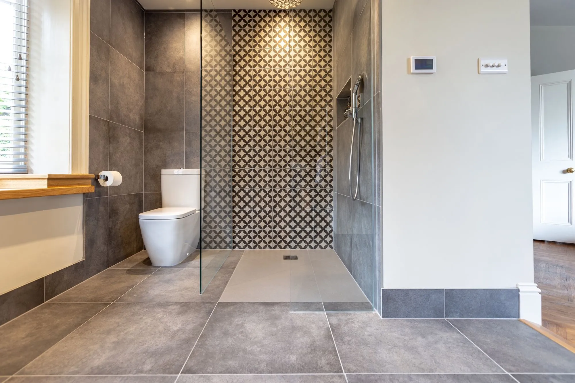 https://cdn.prod.website-files.com/68b836573a7463eca0f2a529/68b836573a7463eca0f2aa45_bathroom_51_5-d32137f6.webp showing a completed bathroom