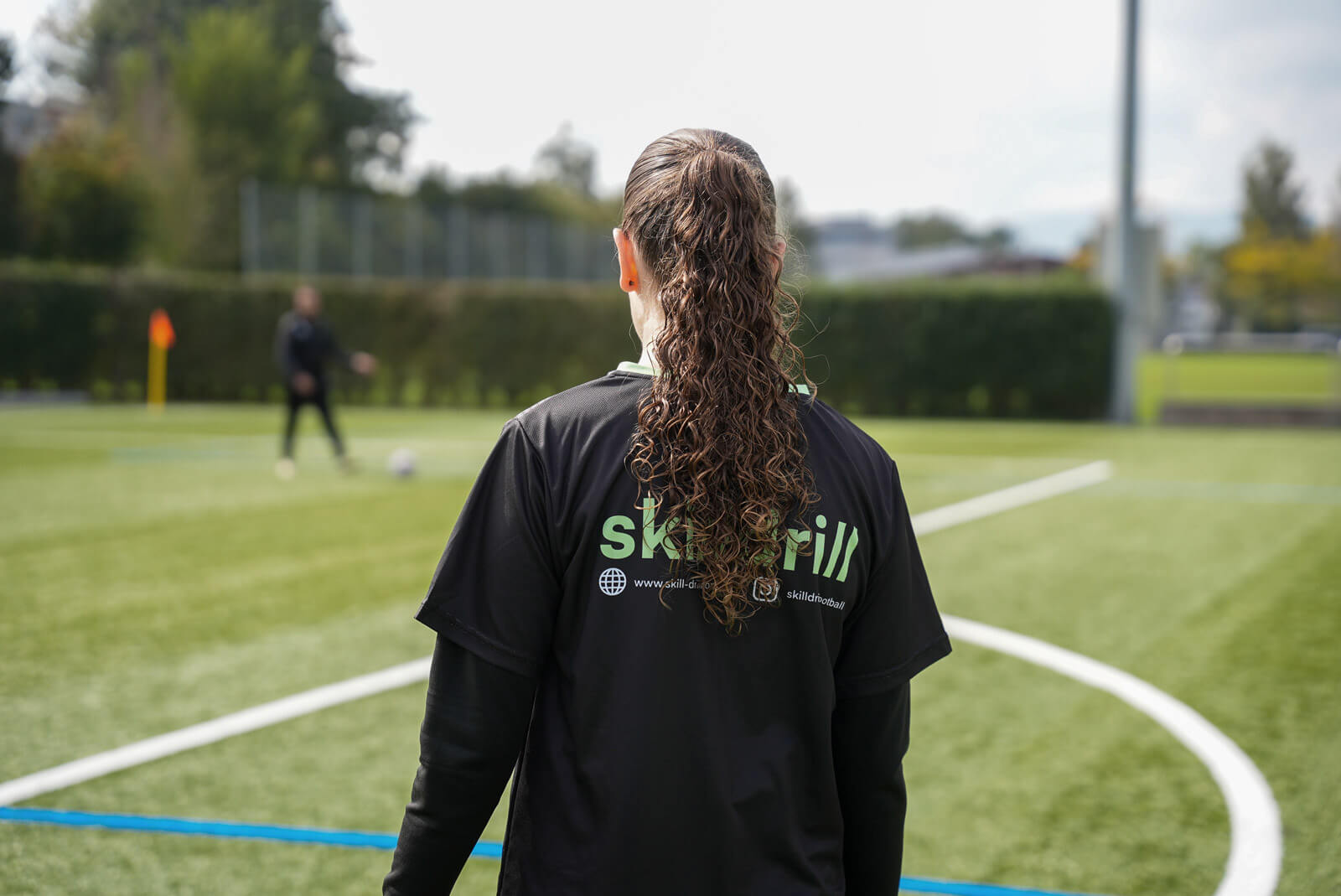 image of a teacher interacting with students using digital tools (for an edtech)