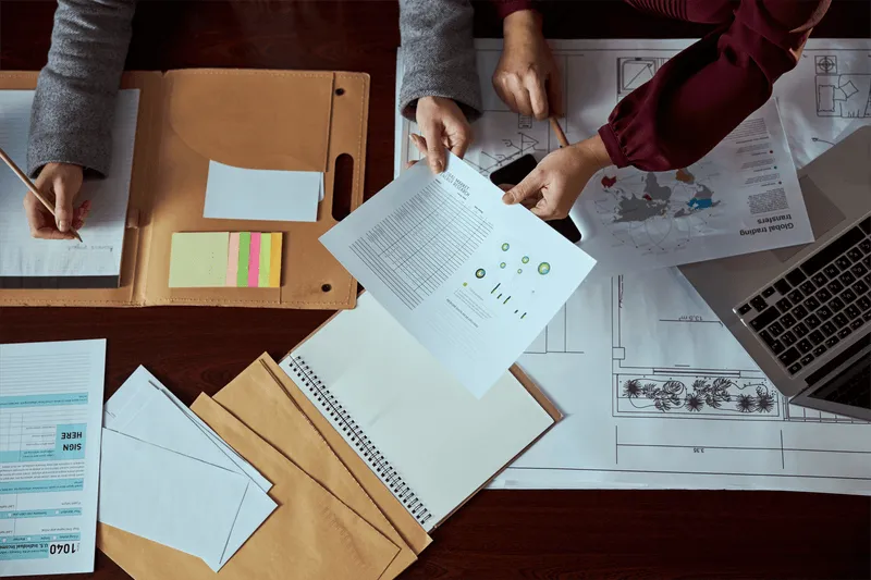 People discussing documents