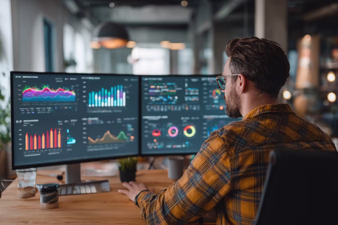 Diverse professionals remote monitoring dashboards