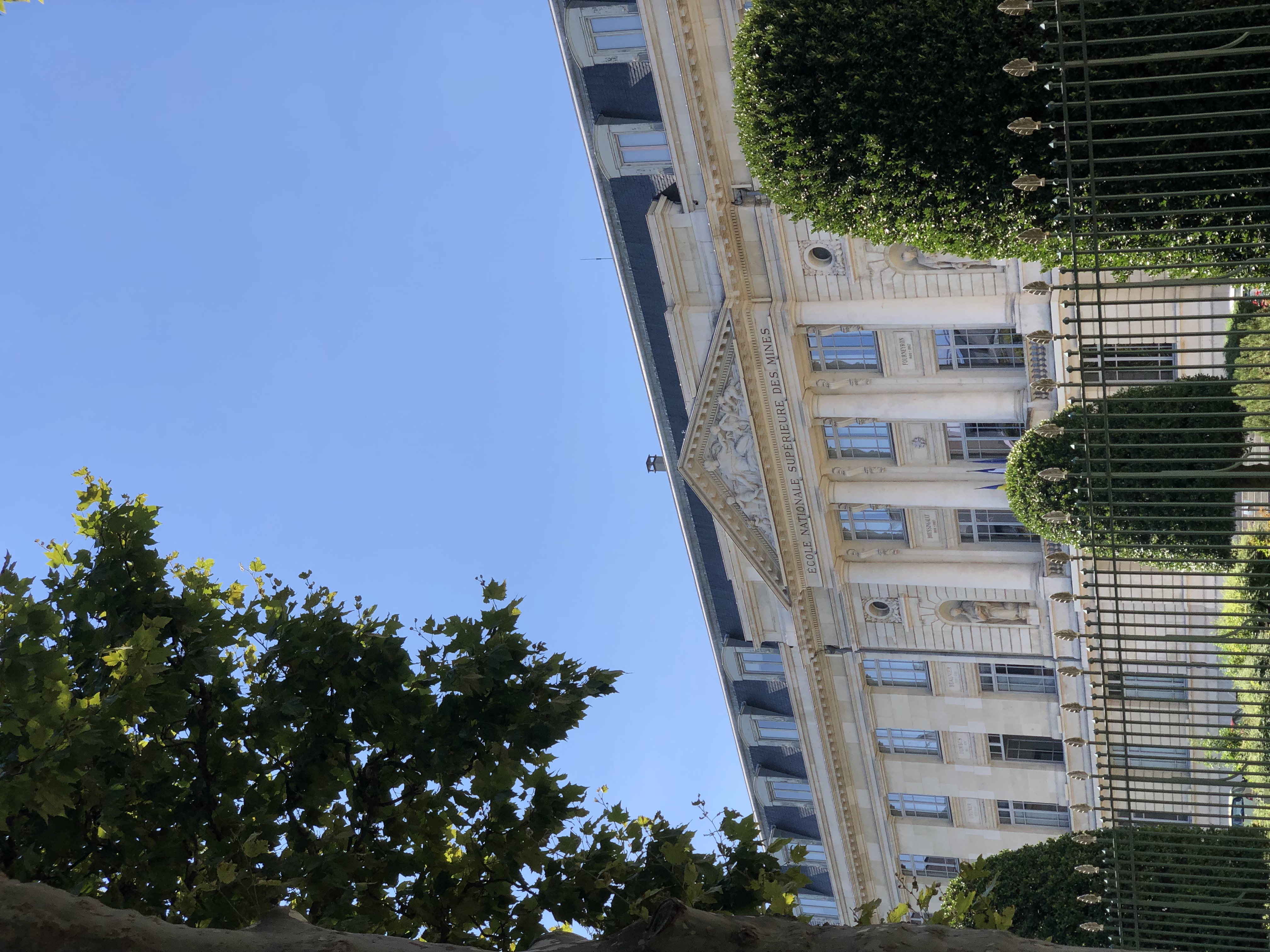 image of engineers working on satellite components [team]