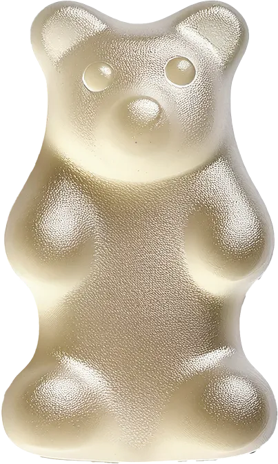 A white teddy bear shaped object sitting on top of a table.