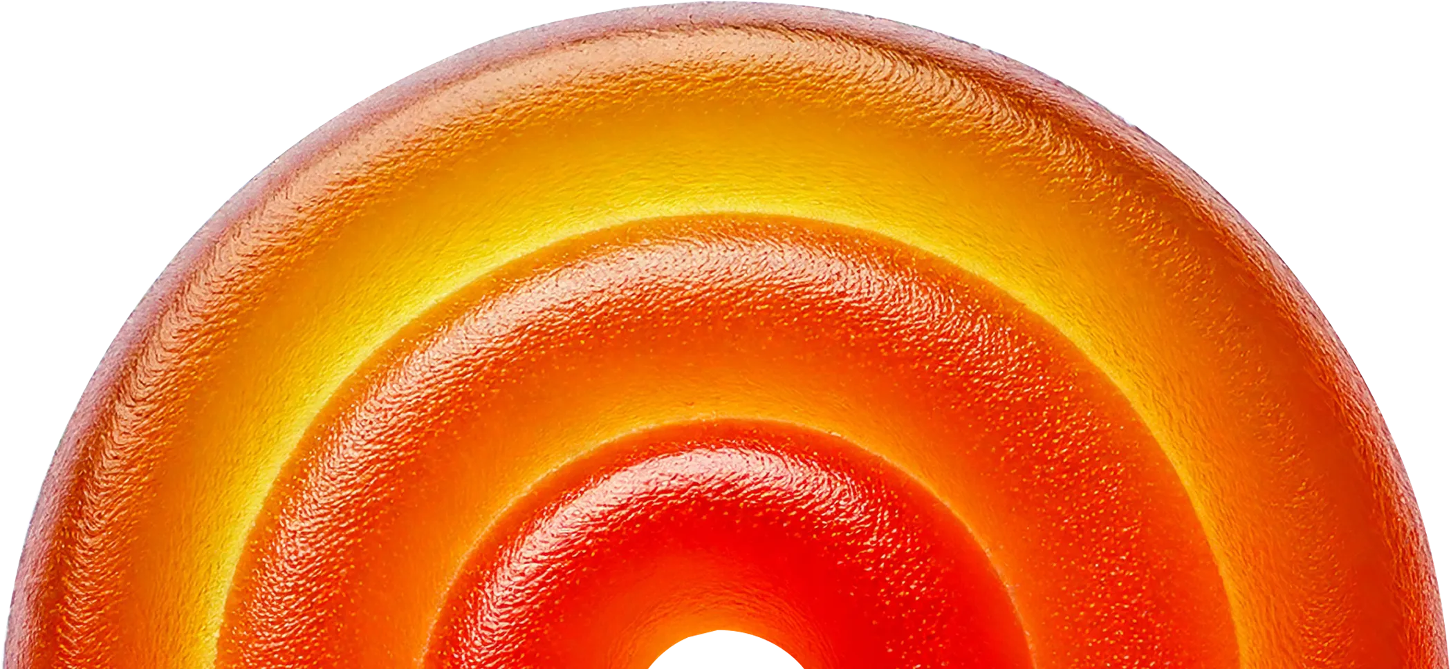 A close up of an orange object with a black background.