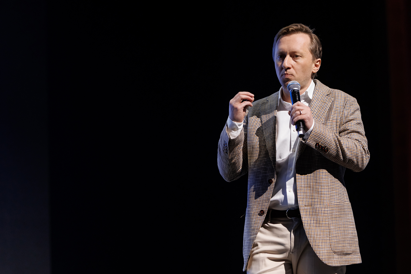 Mikhail Kritsky, founder and CEO of UNOWA, speaking at an education industry event