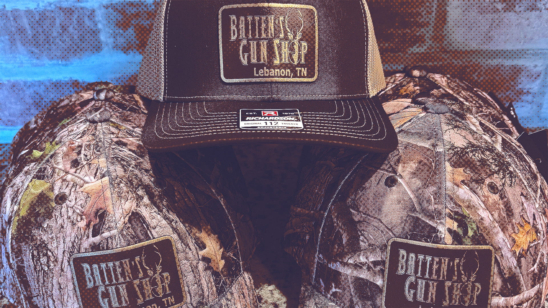 Three camouflage caps with Batten's Gun Shop logo and Lebanon, TN text on the front.