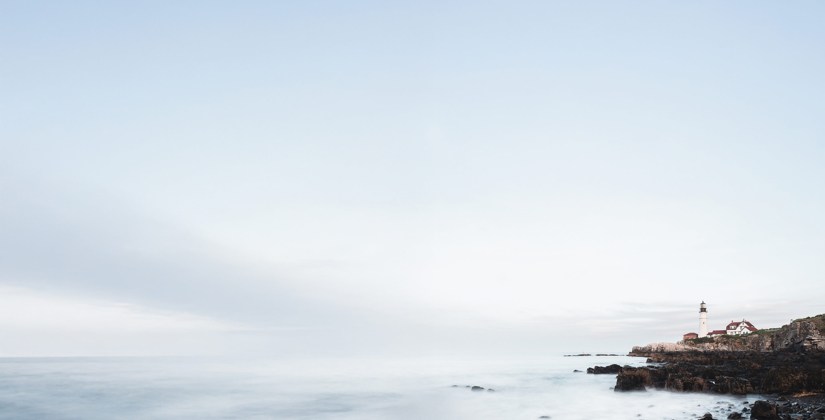Portland Head Light lighthouse on the Maine coast, symbolizing trusted financial planning in Portland, ME & Portsmouth, NH.