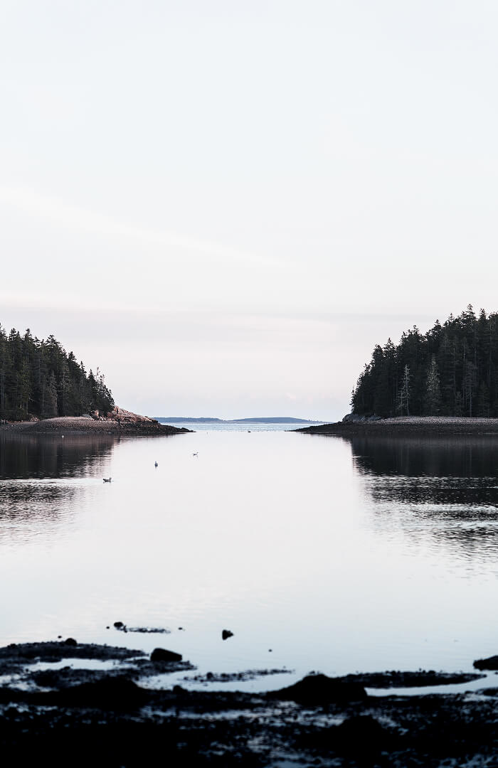 Maine coastal inlet at dusk, representing Cornerstone’s thoughtful, local approach to financial planning.