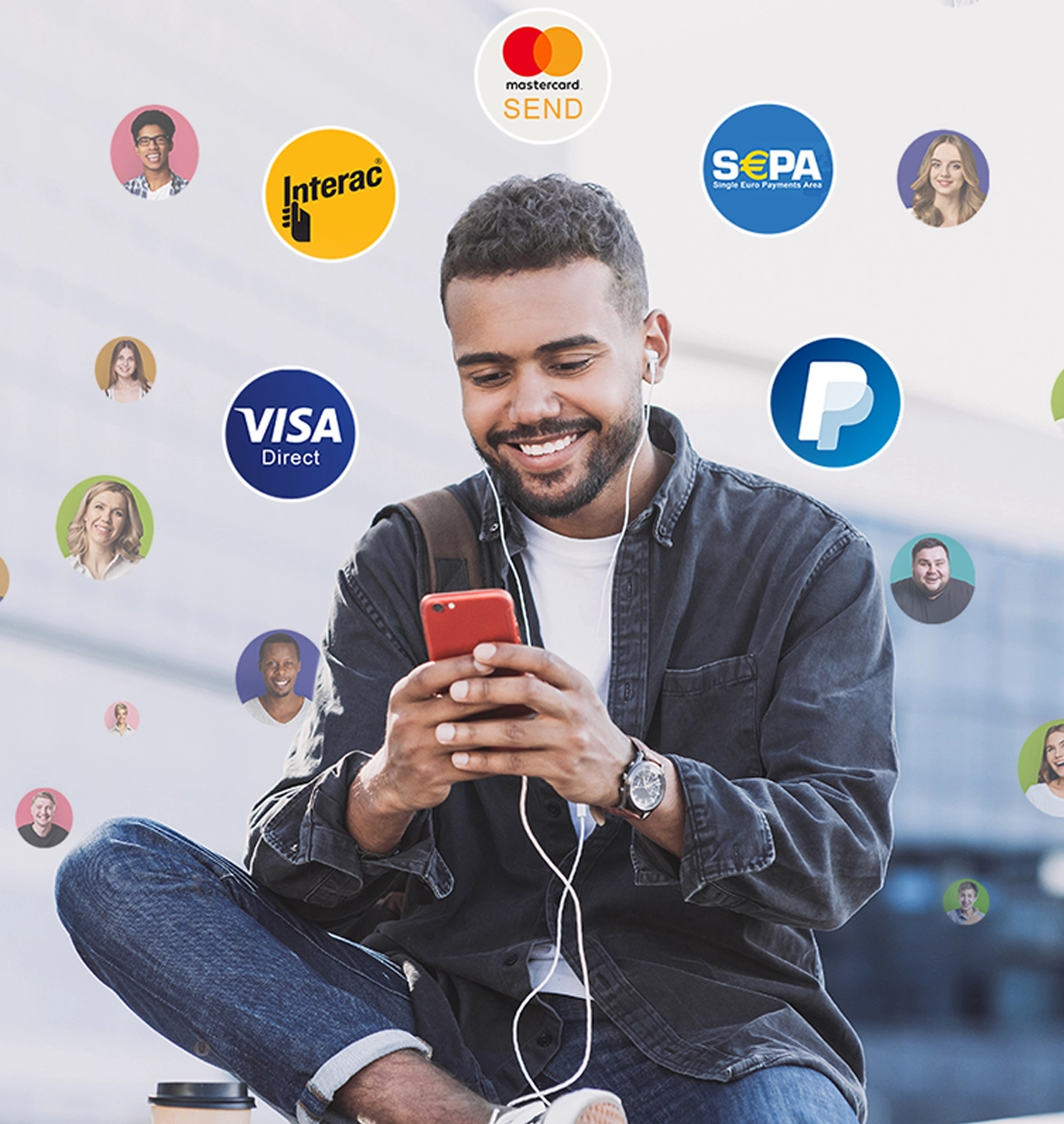 A man sitting, smiling at his cellphone with a range of circled illustrations of payment methods around him.