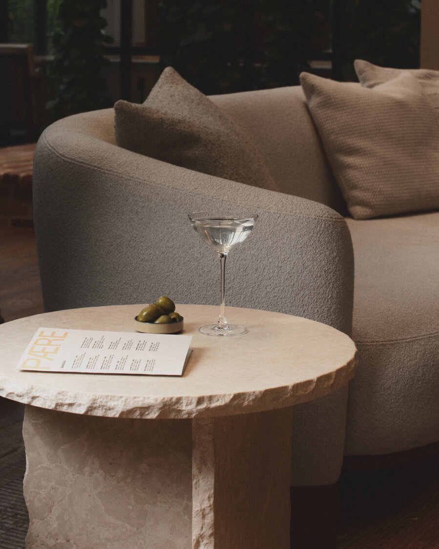 drink on table next to couch