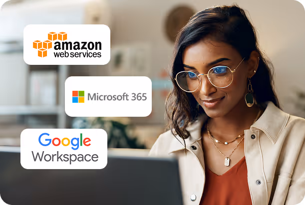 Woman wearing glasses working on a laptop with Amazon Web Services, Microsoft 365, and Google Workspace logos floating beside her.