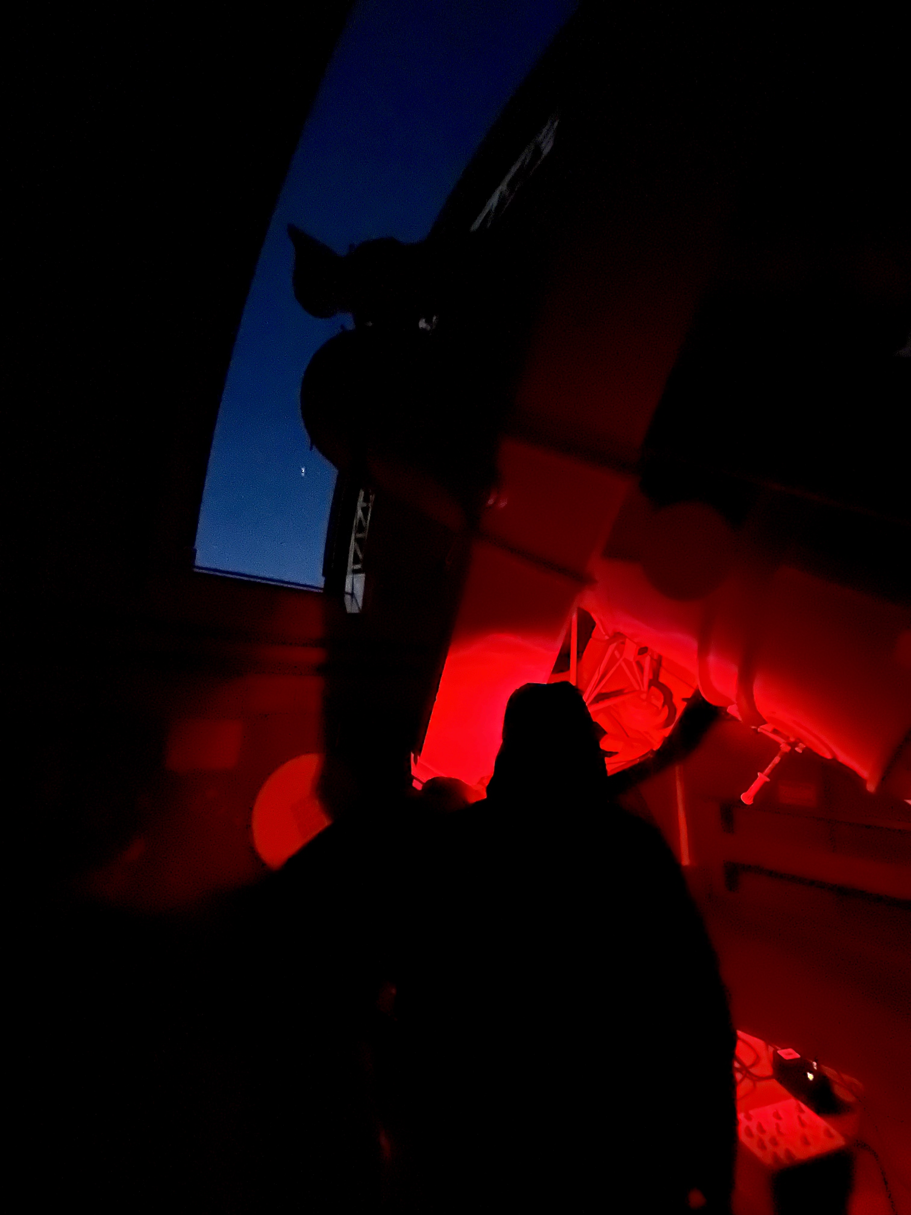 image of engineers working on satellite components [team]