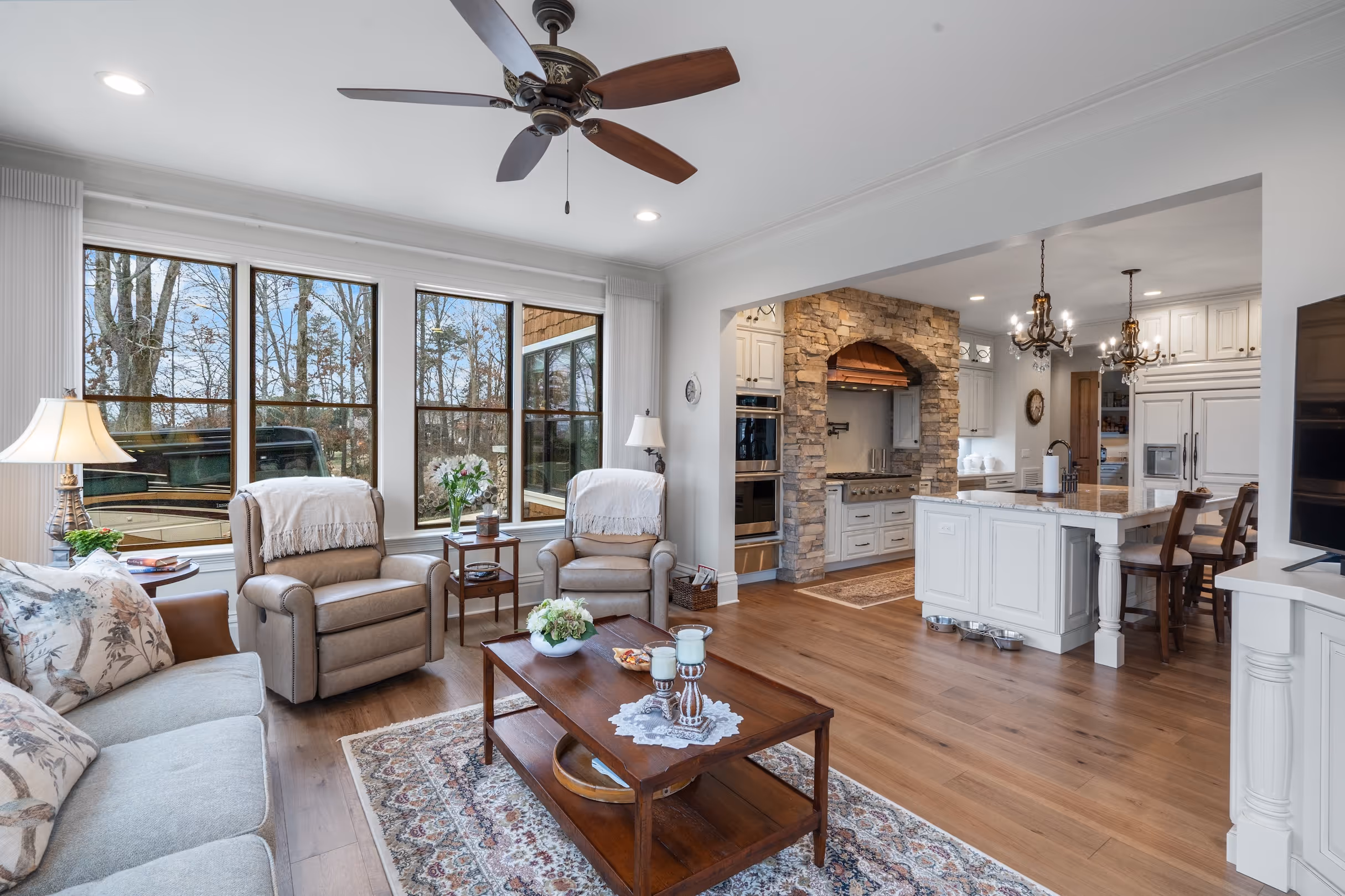 Shiver House is a mountain view custom home with timber beams, vaulted ceilings, and a stone fireplace, built by Lamon & McDaniel Builders.