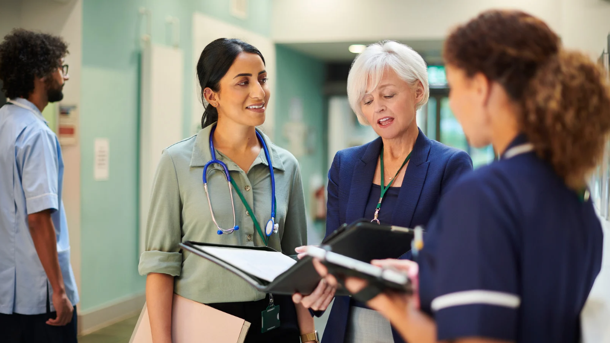 medical team discussing medwrite notes