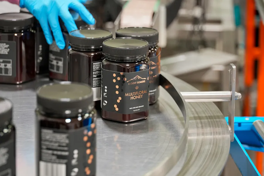 Manuka Multifloral honey being packed