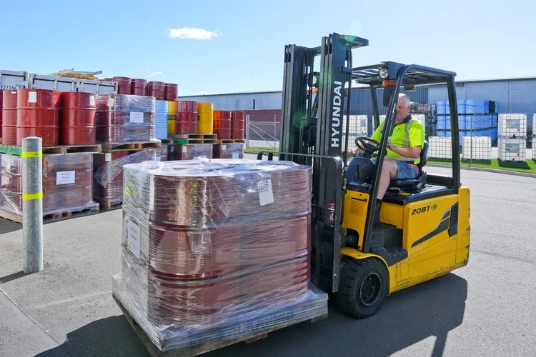 Forklift shifting 4 drums of Manuka honey