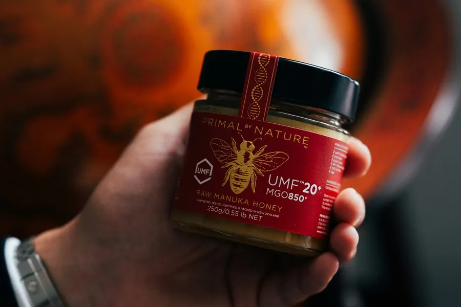 Man holding Primal by Nature Manuka UMF 20+