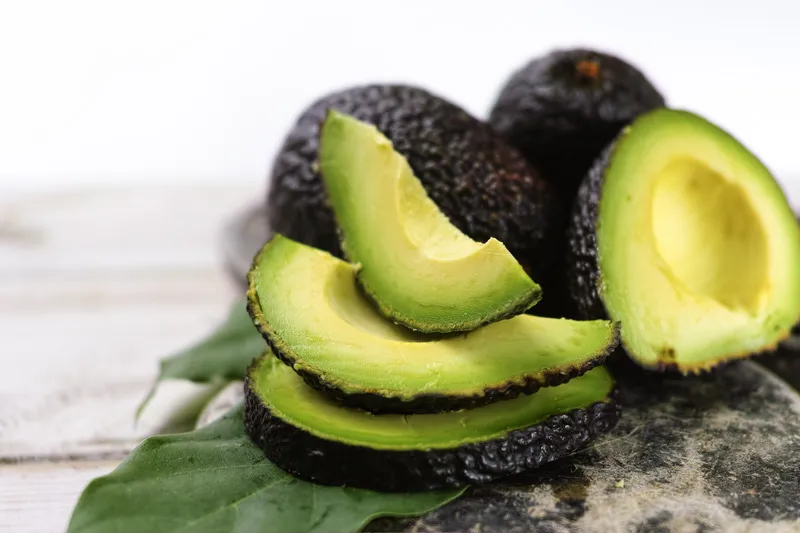 Close up of cut avocados