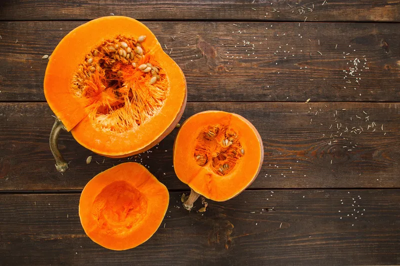 Top down image of pumpkins cut in half