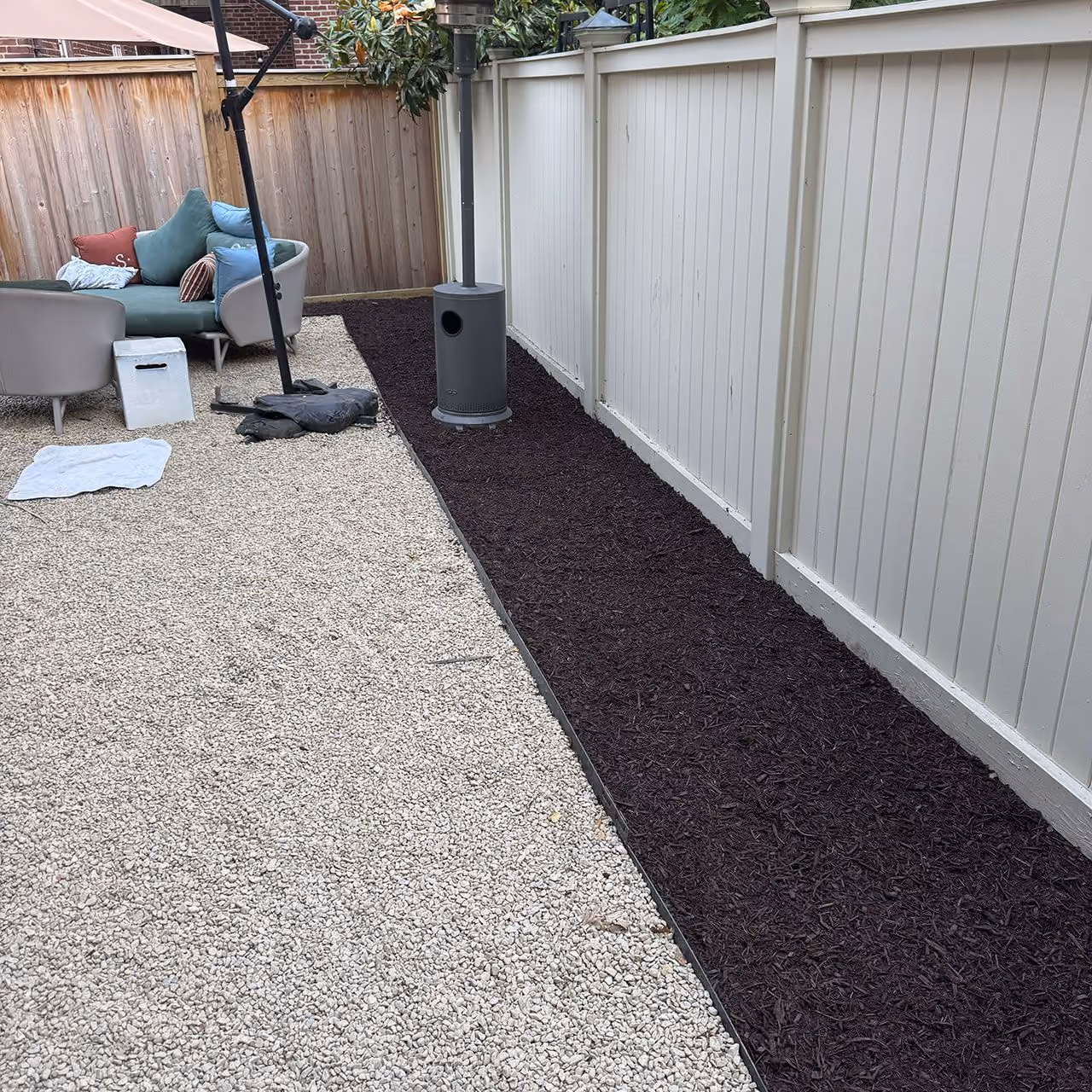 Fresh mulch installation by Morrisroe Landscaping for professionally maintained landscape beds near me