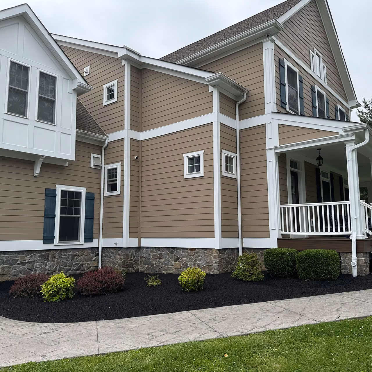 Landscape bed maintenance by Morrisroe Landscaping