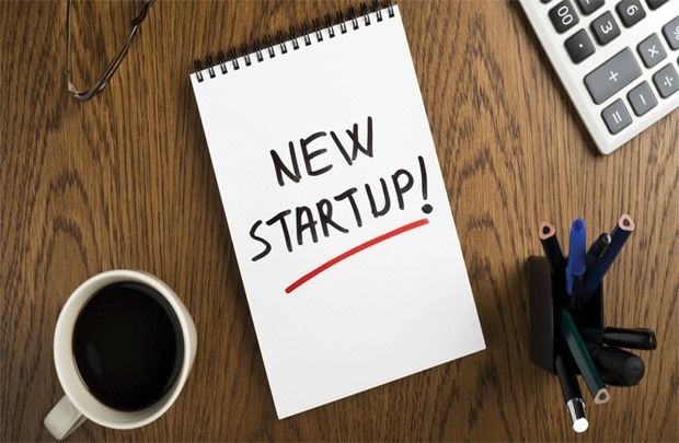 A graphic image of a notepad saying 'New Startup!'