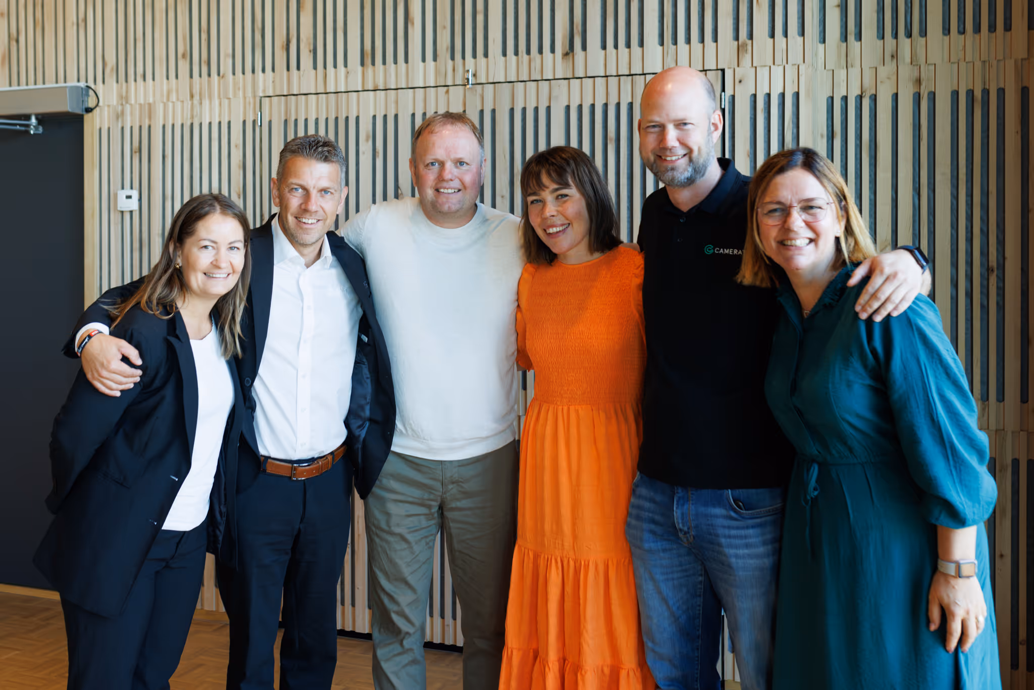 gruppebilde av arrangørene av et arrangement