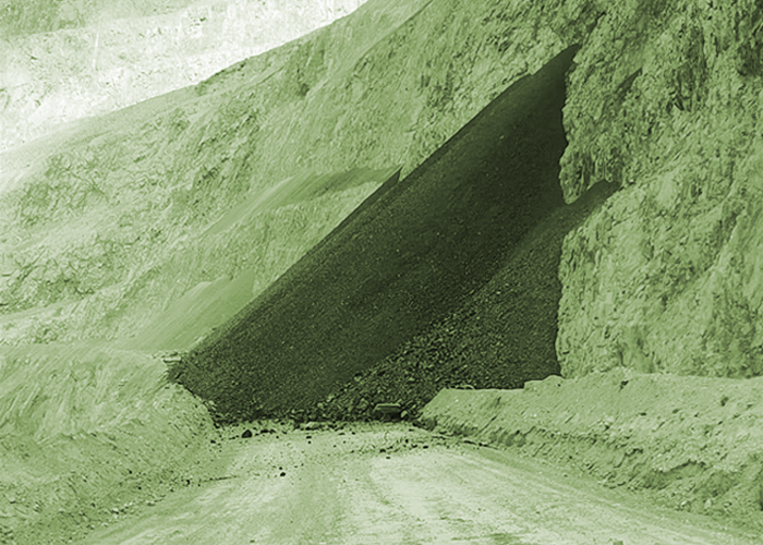 Ramp on mine site blocked off with blast debris