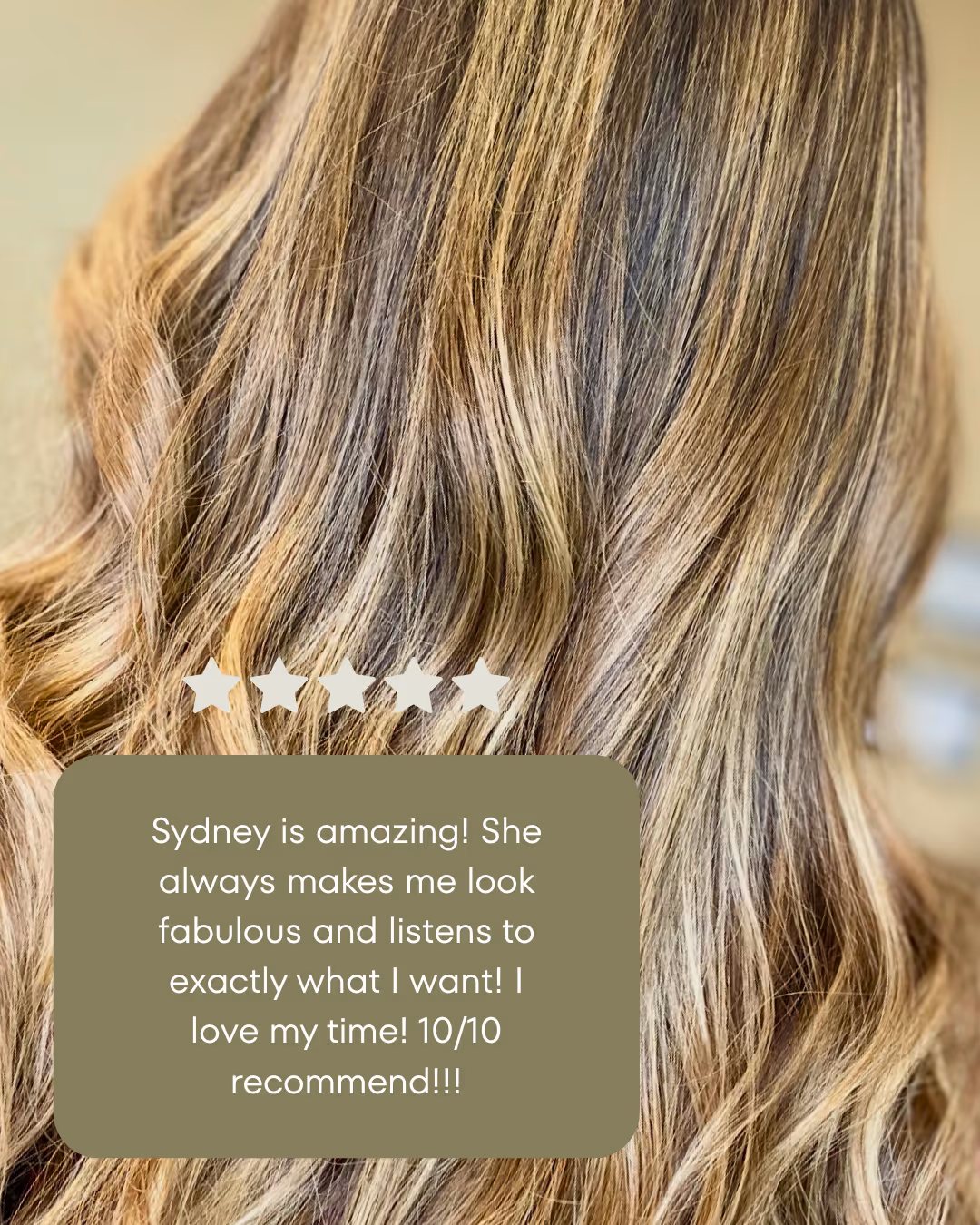 Close-up of long, wavy, highlighted blonde and brown hair with an overlaid five-star rating and a glowing customer review praising Sydney's styling.