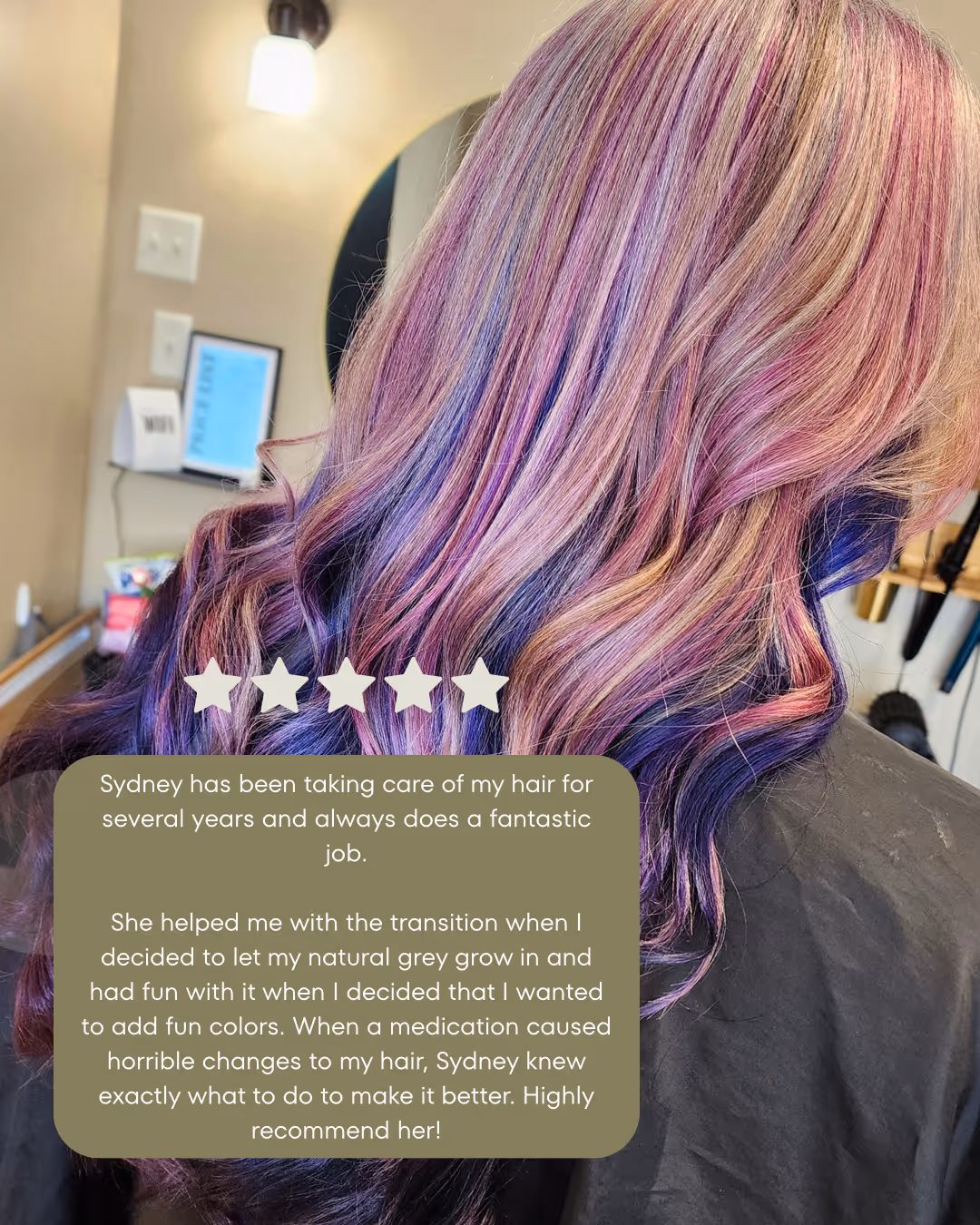 Back view of long, wavy hair dyed in shades of purple, pink, and blonde with a five-star rating and positive testimonial about hair care service.