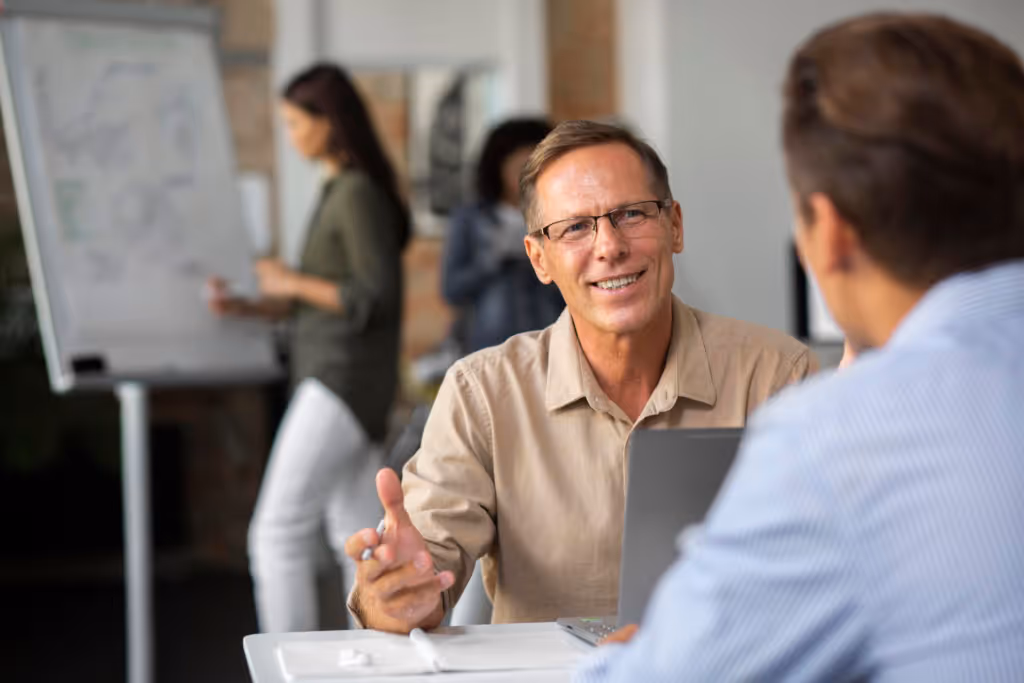 people using digital device while meeting